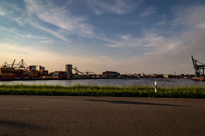 Pier over river against sky