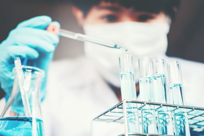 Close-up of scientist working in laboratory