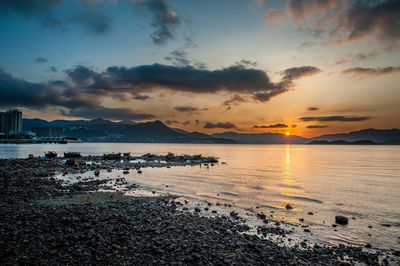 Scenic view of sea against sky during sunset