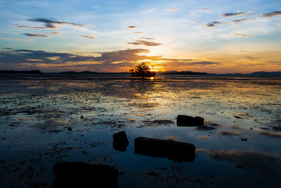 Scenic view of sea against sky during sunset