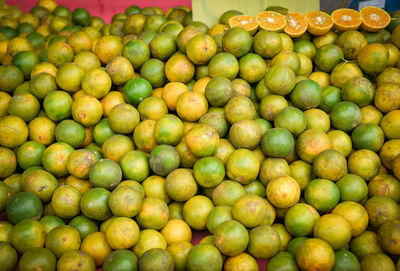 Full frame shot of oranges in market