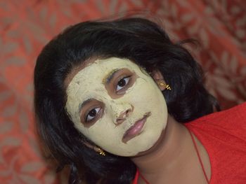 Portrait of girl wearing facial mask