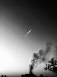 Low angle view of vapor trails in sky