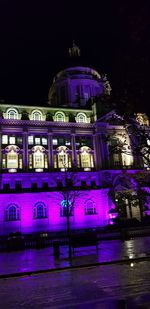 Illuminated building at night