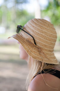 Close-up of woman wearing hat