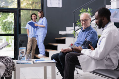 Business colleagues working in office