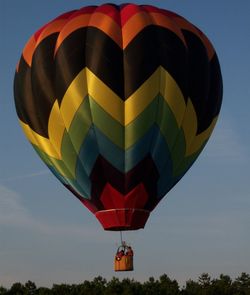 Low angle view of colorful hot air balloon against sky