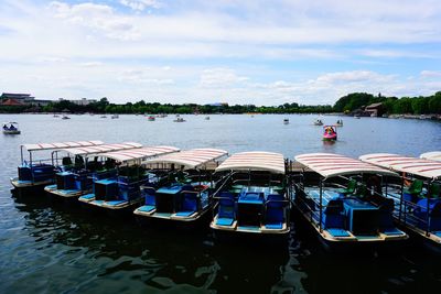 Boats moored in sea