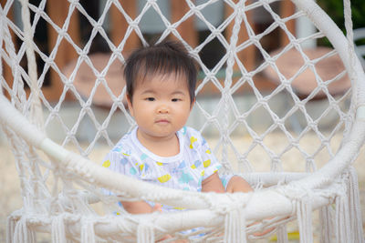 Portrait of cute girl looking at camera