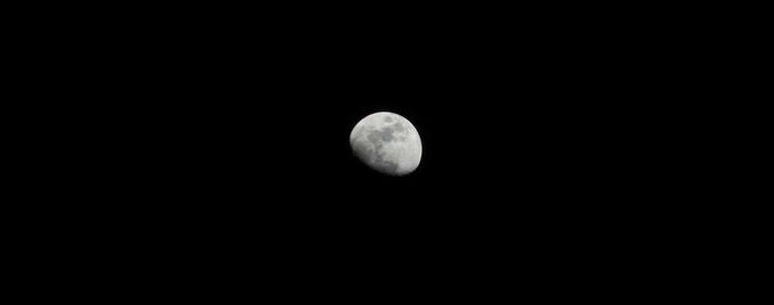 Scenic view of moon against sky at night