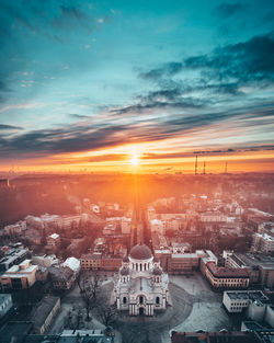 High angle view of city during sunset