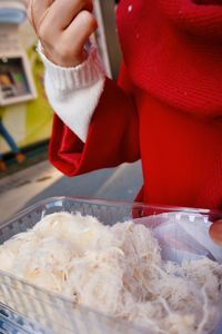 Midsection of person preparing food