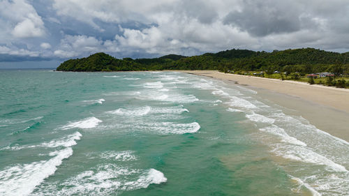 Aerial drone of tropical landscape with a beautiful beach. kimihang beach. borneo, sabah, malaysia.