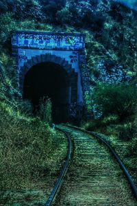 Railroad tracks in tunnel