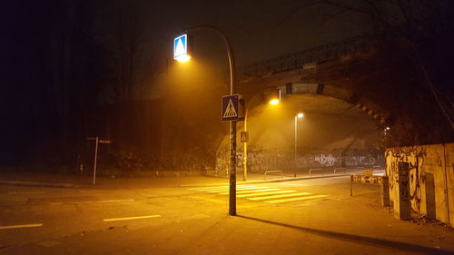 Illuminated street light at night