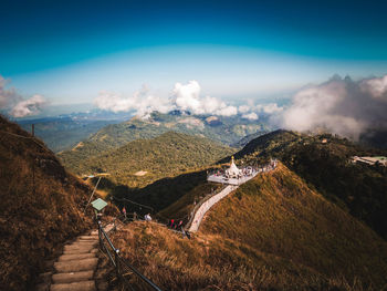 High angle view of road amidst mountains against sky