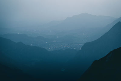 Scenic view of mountains against sky during winter