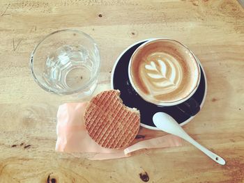 High angle view of coffee cup on table