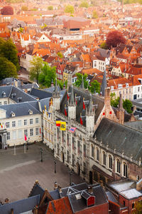 High angle view of street amidst buildings in town