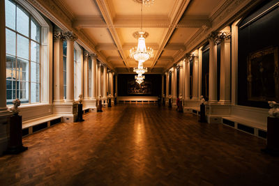 Illuminated corridor of building