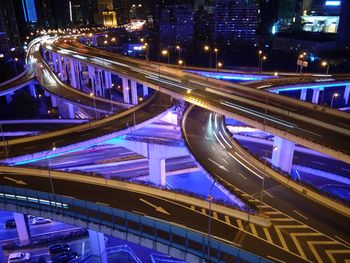 High angle view of light trails on bridge