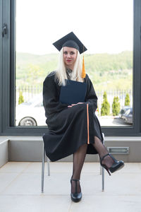 Full length of woman standing in city