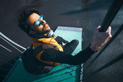 High angle view of man using mobile phone