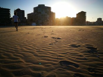 Full length of man walking on beach
