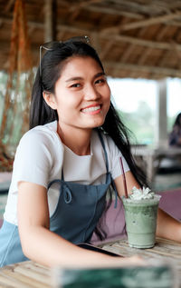 Portrait of a smiling young woman