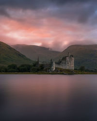 Scenic view of kilchurn castle at sunset