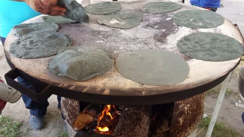 Low section of man preparing food