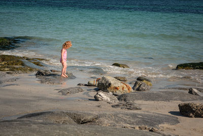 Full length of woman on beach