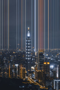 Illuminated buildings in city at night