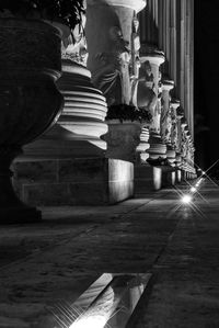 Statue in illuminated building at night