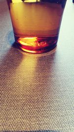 Close-up of beer on table