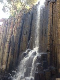 Low angle view of waterfall