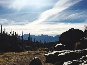 Scenic view of silhouette mountains against sky