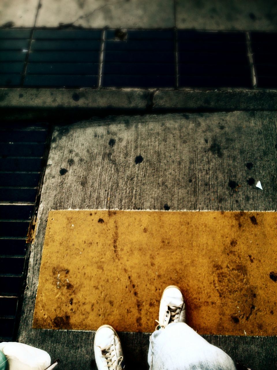 shoe, low section, personal perspective, person, metal, high angle view, standing, footwear, part of, human foot, day, men, dirty, close-up, abandoned, outdoors, unrecognizable person