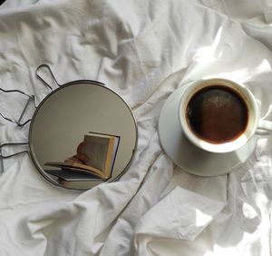 High angle view of coffee cup on table