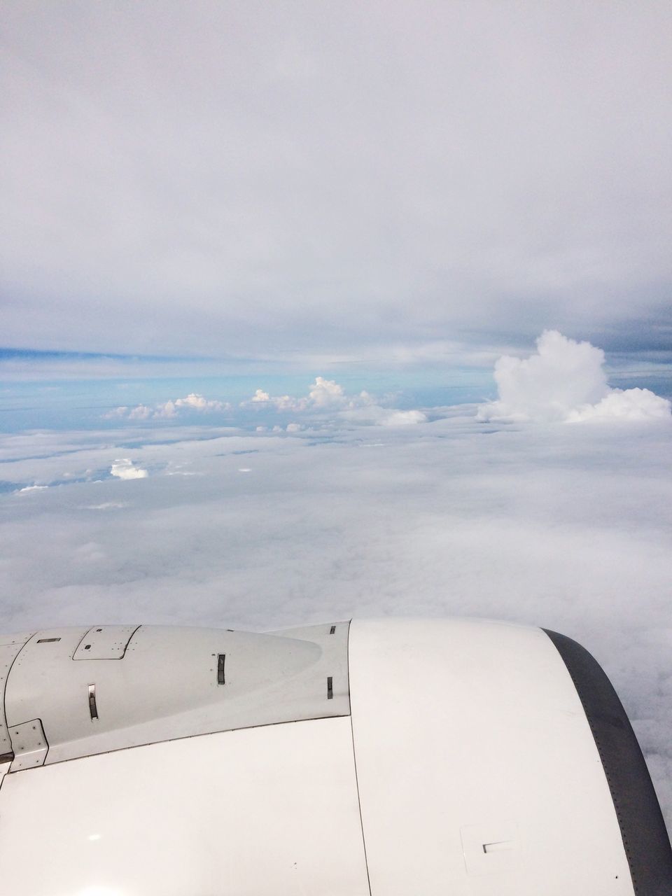 sea, horizon over water, sky, flying, scenics, airplane, transportation, tranquil scene, tranquility, beauty in nature, water, nature, mode of transport, cloud - sky, air vehicle, part of, cropped, day, cloud, idyllic