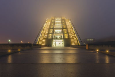 Illuminated building at night