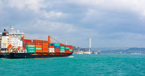 Ship in sea against sky