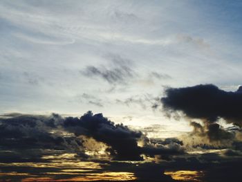 Low angle view of dramatic sky during sunset