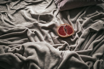 High angle view of fruits on bed