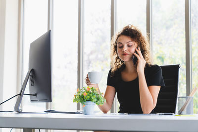 Woman working on table