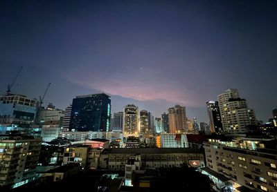 Buildings in city against sky