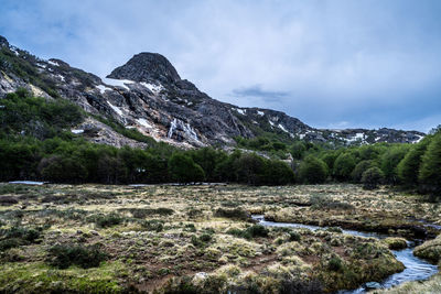 Scenic view of rocky mountains against sky