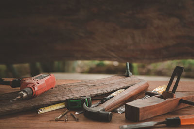 Close-up of work tools on table