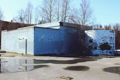 Abandoned building against clear sky