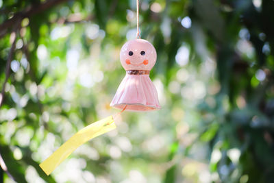 Close-up of decoration hanging on tree